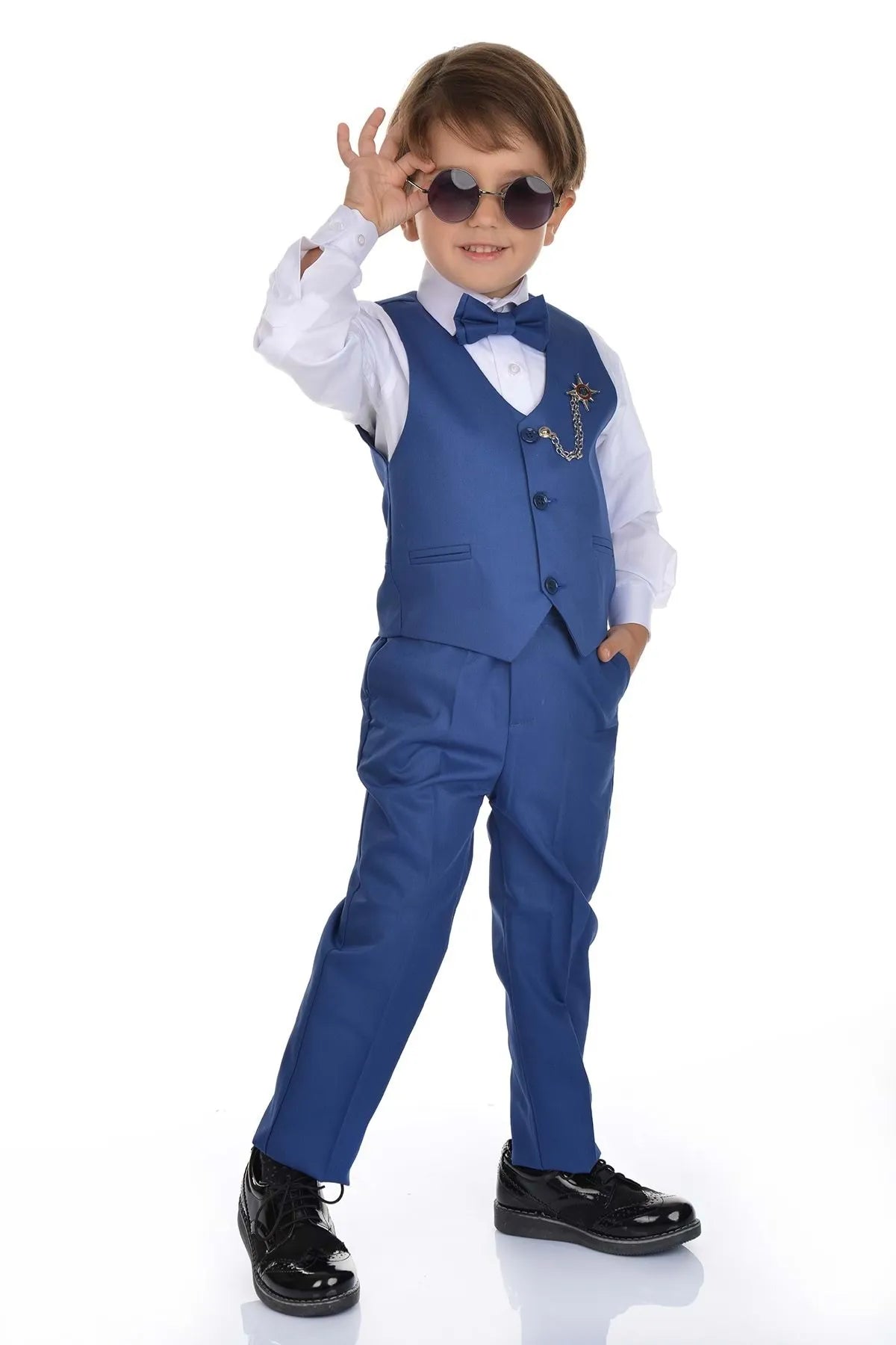 - Air box TSA certified check-inMnk Boy's Indigo Vest Tuxedo Suit